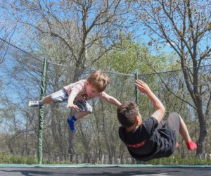 Kids playing in a trampoline